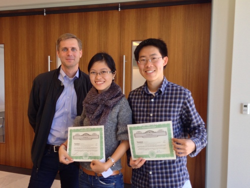 Justin, Thuy, and Elliot with Greengar Stock Certificates